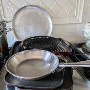 Mixed Cookware Lot with Calphalon Skillet and Press